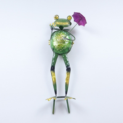 Garden frog with floor lamp decoration